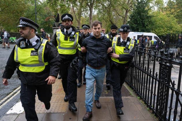 Pro-Palestinian protesters march In London LONDON, UNITED KINGDOM - OCTOBER 7: Police officers detain a Pro-Palestinian demonstrator during a protest in central London, United Kingdom, on October 7, 2026, marking the third anniversary of the October 7, 2023 attacks. Thomas Krych Anadolu London United Kingdom. Editorial use only. Please get in touch for any other usage.  Copyright: x2026xAnadoluxThomasxKrychx