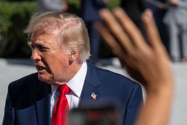 October 7, 2026, Washington, District Of Columbia, United States: President DONALD TRUMP speaks to reporters on the South Lawn of the White House before departing for San Antonio, Texas, where he is scheduled to headline a midterm campaign rally at Freeman Coliseum as Republicans seek to boost turnout and support candidates including Texas Attorney General KEN PAXTON. Washington United States  - ZUMAk206 20261007_znp_k206_003 Copyright: xMattxKaminskyx