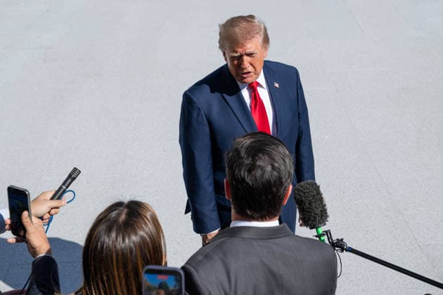 October 7, 2026, Washington, District Of Columbia, United States: President DONALD TRUMP speaks to reporters on the South Lawn of the White House before departing for San Antonio, Texas, where he is scheduled to headline a midterm campaign rally at Freeman Coliseum as Republicans seek to boost turnout and support candidates including Texas Attorney General KEN PAXTON. Washington United States - ZUMAk206 20261007_znp_k206_010 Copyright: xMattxKaminskyx