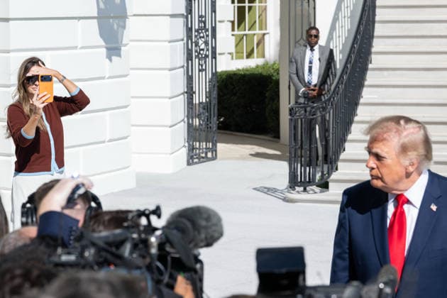 October 7, 2026, Washington, District Of Columbia, United States: White House Communications Adviser MARGO MARTIN films President DONALD TRUMP as he speaks to reporters on the South Lawn of the White House before departing for San Antonio, Texas. Washington United States - ZUMAk206 20261007_znp_k206_017 Copyright: xMattxKaminskyx