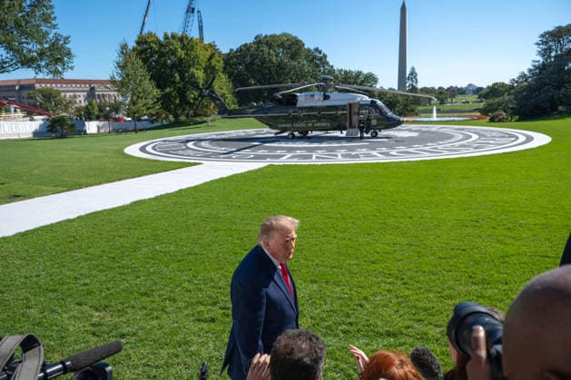 October 7, 2026, Washington, District Of Columbia, United States: President DONALD TRUMP speaks to reporters on the South Lawn of the White House before departing for San Antonio, Texas, where he is scheduled to headline a midterm campaign rally at Freeman Coliseum as Republicans seek to boost turnout and support candidates including Texas Attorney General KEN PAXTON. Washington United States - ZUMAk206 20261007_znp_k206_029 Copyright: xMattxKaminskyx