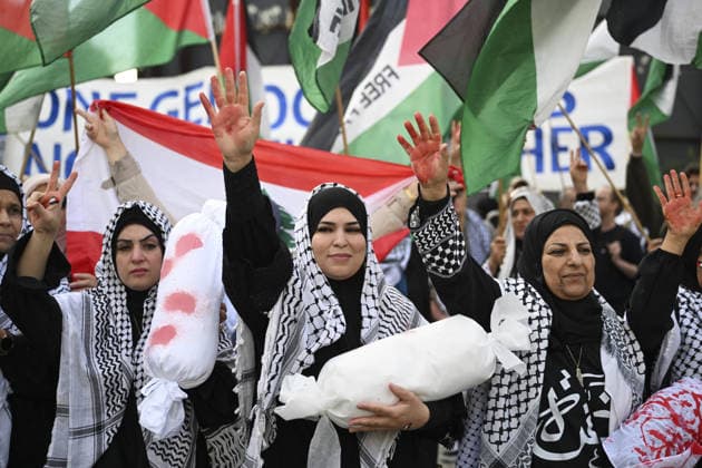 Police in Berlin intervened in demonstrations in support of Palestinians BERLIN, GERMANY - OCTOBER 7: Demonstrators hold toy dolls wrapped in white shrouds to symbolize Palestinian children killed in Israeli attacks, during a pro-Palestine rally organized by Palestinian associations at the intersection of Zimmer and Friedrich streets in Berlin, Germany on October 7, 2026. Halil Sagirkaya Anadolu Berlin Germany. Editorial use only. Please get in touch for any other usage.  Copyright: x2026xAnadoluxHalilxSagirkayax