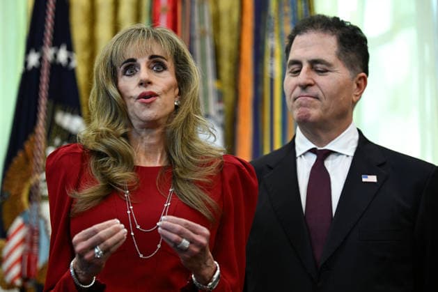 WASHINGTON, DC - OCT. 7: Susan Dell, wife of Dell Technologies CEO Michael Dell, left, speaks during an announcement with United States President Donald J Trump on Trump Accounts in the Oval Office of the White House in Washington, DC, USA, on Wednesday, October 7, 2026. Looking on from right is Michael S Dell, founder, chairman, and CEO of Dell Technologies. Copyright: xAnnabellexGordon PoolxviaxCNPx MediaPunchx