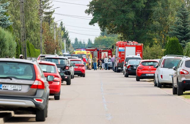 Stabbing attack at a primary school in Poland Photo: Wojciech Olkusnik East News Emergency services are seen at the site after a knife attack at the local primary school on October 8, 2026 in the village of Leszczydol-Nowiny in central Poland, approximately 60 km north-east of Warsaw. A 15-year-old school graduate entered the building armed with a knife and fatally stabbed the janitor and wounded two teachers trying to overpower him. According to the police the perpetrator was wearing a helmet with a camera and planned to record the attack. A day earlier a stabbing attack, where nine people were wounded, occurred in a vocational school in the town of Ostroleka, 50 km north of today s site. EN_01685559_0008 