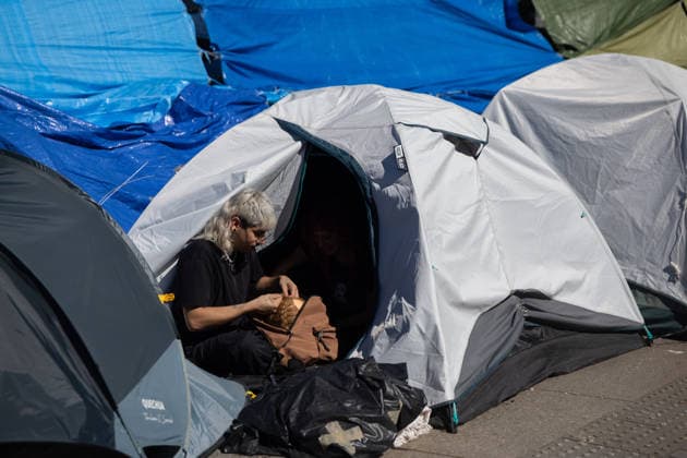 Protesters at Sol Square Stand by Their Demands for Housing A person at the housing protest camp in Puerta del Sol on October 8, 2026, in Madrid, Spain. The encampment at Sol has spilled over into the square, and the protesters are maintaining their demands against evictions and exorbitant rents. The Official State Gazette (BOE) published yesterday, October 7, the new version of the housing and rent decrees that the Council of Ministers approved the previous day OCTOBER 8, 2026, Madrid, Spain  Copyright: xEduardoxParrax 7829177