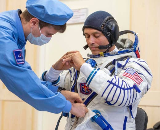 October 8, 2026, Baikonur, Kazakhstan: Baikonur, Kazakhstan. 14 July, 2026. NASA astronaut Anil Menon is helped into his Russian Sokol suit at the Baikonur Cosmodrome before the Expedition 75 launch, July 14, 2026 in Baikonur, Kazakhstan. He launched to the International Space Station later that day. Baikonur Kazakhstan - ZUMAp138 20261008_zaa_p138_009 Copyright: xPavelxShvets Gctcx