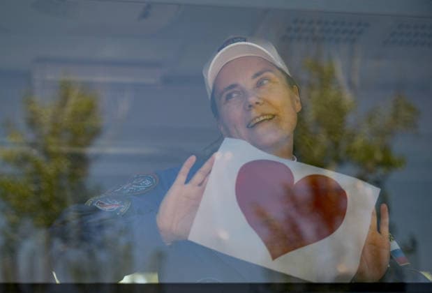October 8, 2026, Baikonur, Kazakhstan: Baikonur, Kazakhstan. 14 July, 2026. Roscosmos cosmonaut Anna Kikina holds up a heart sign from the bus as she and crewmates Pyotr Dubrov and Anil Menon depart the Cosmonaut Hotel for suit-up, July 14, 2026 in Baikonur, Kazakhstan. The crew launched later that day to the International Space Station. Baikonur Kazakhstan - ZUMAp138 20261008_zaa_p138_053 Copyright: xBillxIngalls Nasax