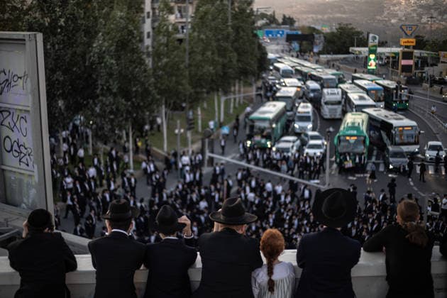 Anti-military service Ultra-Orthodox Jews block road to West Jerusalem JERUSALEM - OCTOBER 8: Ultra-Orthodox Jews, known as Haredi, protest the lack of legislation exempting yeshiva students from mandatory military service and the detention of students on grounds of draft evasion in West Jerusalem, on October 8, 2026. Haredi protesters lie on the road leading to West Jerusalem and block traffic, while Israeli police deployed to the scene intervene against the demonstrators. Mostafa Alkharouf Anadolu Jerusalem Israel. Editorial use only. Please get in touch for any other usage.  Copyright: x2026xAnadoluxMostafaxAlkharoufx