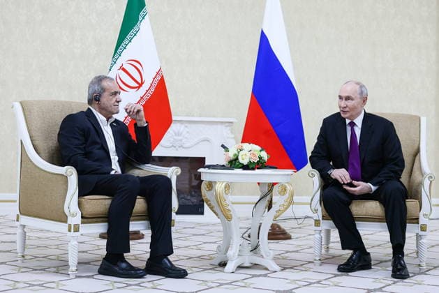 TURKMENISTAN, BALKAN PROVINCE - OCTOBER 8, 2026: Masoud Pezeshkian (L), President of Iran, and his counterpart Vladimir Putin of Russia hold a bilateral meeting in Turkmenbasy. Vladimir Smirnov TASS  98963430