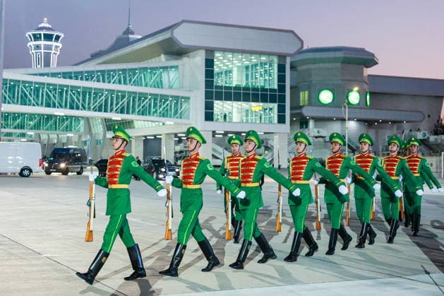 TURKMENISTAN, BALKAN PROVINCE - OCTOBER 8, 2026: Guards of honour attend a ceremony to welcome the arrival of Vladimir Putin, President of Russia, ahead of a meeting of the CIS (Commonwealth of Independent States) Council of Heads of State in Turkmenbasy. Vladimir Smirnov TASS  98966033