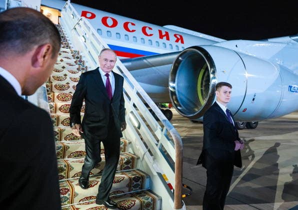 TURKMENISTAN, BALKAN PROVINCE - OCTOBER 8, 2026: Vladimir Putin (L), President of Russia, steps off his plane ahead of a meeting of the CIS (Commonwealth of Independent States) Council of Heads of State in Turkmenbasy. Vladimir Smirnov TASS  98966077