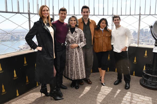 NEW YORK, NY- OCTOBER 8: Allegra Edwards, Parker Young, Rose Abdoo, Ed Weeks, Helen J. Shen and Jaren Lewison at the Empire State Building to Celebrate the Premiere of CBS New Series, Eternally Yours on October 8, 2026 in New York City. Copyright: xmpi099 MediaPunchx