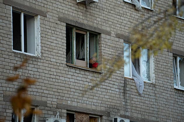 Russian Strike Hits Kramatorsk Buses A resident looks from a broken window of an apartment building damaged near the site of a Russian strike in Kramatorsk, Donetsk region, Ukraine, on October 8, 2026. Ukrainian authorities said a Russian guided bomb struck two scheduled passenger buses in Kramatorsk at about 10:00. At least 30 people were killed and at least 18 wounded, while Ukraine s State Emergency Service later reported 33 deaths; public transport in Kramatorsk and nearby Sloviansk was suspended after the attack. Kramatorsk Donetsk Ukraine Copyright: xOrixAviramx