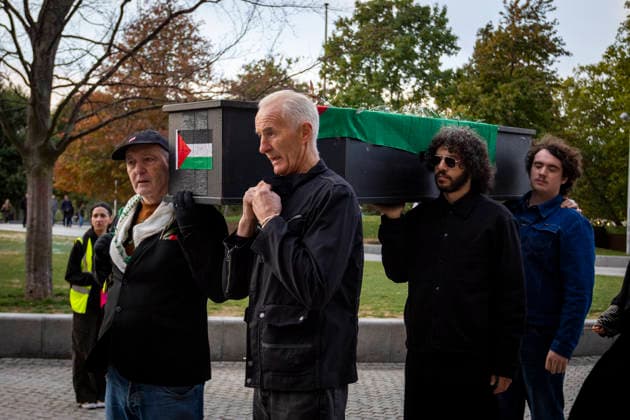 Pro-Palestine Silent Funeral Procession Central London, October 8, 2026 A pro-Palestine silent funeral procession took place in Central London, with demonstrators walking in silence to remember Palestinians killed in the conflict in Gaza. Participants carried Palestinian flags and placards, while some held a coffin and others carried effigies wrapped in burial shrouds, symbolising those killed in the conflict., Credit:Zak Irfan Avalon  Copyright: xZakxIrfanx xAvalonx 1141548407