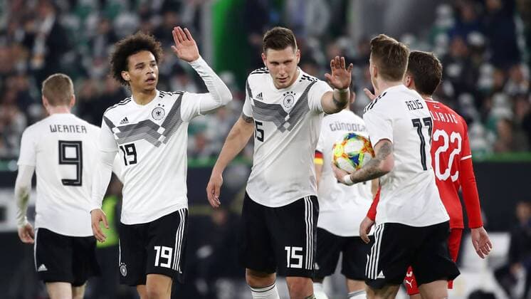 Deutschland - Serbien Fussball Laenderspiel Wolfsburg, 20.03.2019, Volkswagen Arena, Fussball, Laenderspiel , BR Deutschland (GER) vs. Serbien (SRB) 1:1 (0:1) , Im Bild v.l.: Leroy Sane (19, GER, ManCity), Niklas Süle Suele (15, GER, FC Bayern) und Marco Reus (11, GER, Dortmund). , DFB regulations prohibit any use of photographs as image sequences and or quasi-video. ,
