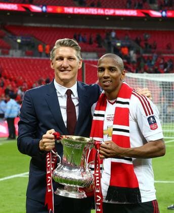 Mandatory Credit: Photo by Michael Zemanek BPI Shutterstock (5691437ci) Bastian Schweinsteiger and Ashley Young of Manchester United, ManU poses with the FA Cup trophy during the Emirates FA Cup Final match between Manchester United and Crystal Palace played at Wembley Stadium, London on 21st May 2016 The Emirates FA Cup 2015 16 Final Crystal Palace v Manchester United Wembley Stadium, Wembley, London, United Kingdom - 21 May 2016 EDITORIAL USE ONLY No use with unauthorised audio, video, data, fixture lists, club league logos or live services. Online in-match use limited to 75 images, no video emulation. No use in betting, games or single club league player publications. The Emirates FA Cup 2015 16 Final Crystal Palace v Manchester United Wembley Stadium, Wembley, London, United Kingdom - 21 May 2016 EDITORIAL USE ONLY No use with unauthorised audio, video, data, fixture lists, club league logos or live services. Online in-match use limited to 75 images, no video emulation. No use in betting, games or single club league player publications. Copyright: xMichaelxZemanek BPI Shutterstockx 5691437ci