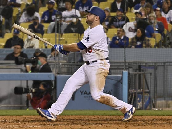 Los Angeles Dodgers Max Muncy hits a solo home run in the eighth inning against the San Diego Padres at Dodger Stadium in Los Angeles on Wednesday, September 29, 2021. The Dodgers defeated the Padres 11-9. LAP2021092917 JIMxRUYMEN