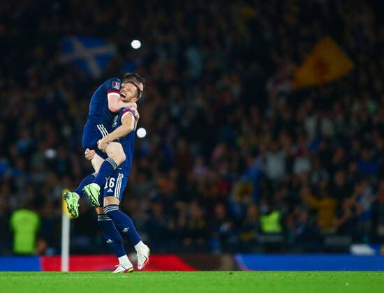 9th October 2021; Hampden Park, Glasgow, Scotland; FIFA World Cup, WM, Weltmeisterschaft, Fussball football qualification, Scotland versus Israel; Liam Cooper of Scotland carries Andy Robertson of Scotland in celebration ActionPlus12330116 VagelisxGeorgariou