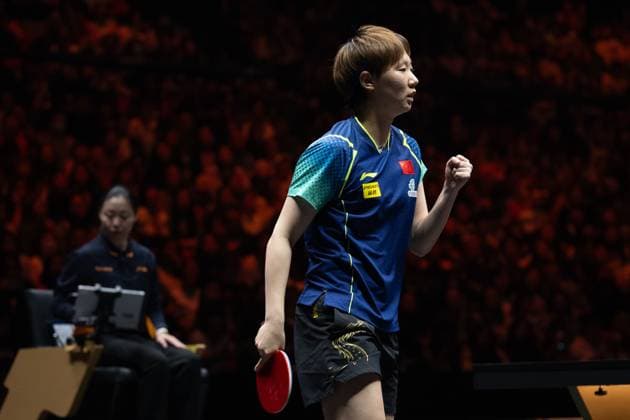 (241003) -- BEIJING, Oct. 3, 2024 -- Wang Manyu of China celebrates scoring during the women s singles round of 16 match against teammate Qin Yuxuan at 2024 World Table tennis, Tischtennis (WTT) China Smash in Beijing, China, Oct. 3, 2024. ) (SP)CHINA-BEIJING-TABLE TENNIS-WTT-CHINA SMASH-WOMEN S SINGLES(CN) XiaoxYijiu