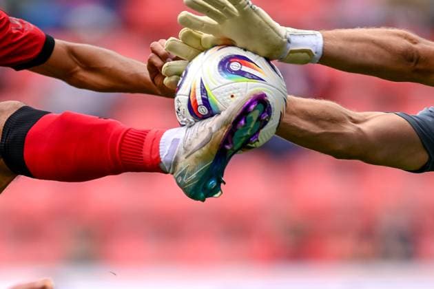 Benjamin Uphoff (Torwart, Rostock, 1) holt Fredrik Carlsen (FC Ingolstadt, 8) den Ball vom Fuß, Symbolfoto, Symbolbild, Zweikampf, Duell, duel, tackle, Dynamik, Action, Aktion, 24.08.2025, Ingolstadt (Deutschland), Fussball, 3. Liga, FC Ingolstadt 04 - F.C. Hansa Rostock, DFB DFL REGULATIONS PROHIBIT ANY USE OF PHOTOGRAPHS AS IMAGE SEQUENCES AND OR QUASI-VIDEO.
