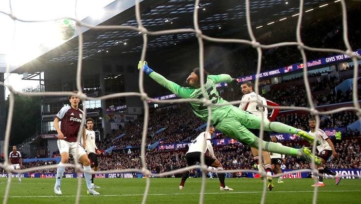 Giorgi Mamardashvili of Liverpool dives but fails to save the opening goal scored by Morgan Rogers of Aston Villa Aston Villa v Liverpool, Premier League, Football, Villa Park, Birmingham, UK - 15 May 2026Birmingham Villa Park United Kingdom EDITORIAL USE ONLY No use with unauthorised audio, video, data, fixture lists, club league logos or live services. Online in-match use limited to 120 images, no video emulation. No use in betting, games or single club league player publications. Copyright: xKieranxMcManus Shutterstockx 16876814ak