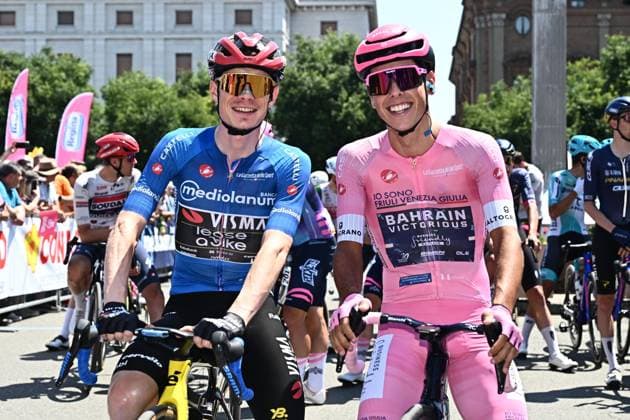 May 22, 2026, Alessandria, ITALY: Portuguese rider Afonso Eulalio (R) of Bahrain Victorious, wearing the overall leader s pink jersey, and Danish rider Jonas Vingegaard Hansen of Team Visma Lease A Bike, wearing the best climber s blue jersey, pose for photographer ahead of the start of the 13th stage of the 109 Giro d Italia 2026, over 189 km from Alessandria to Verbania, Italy, 22 May 2026. ANSA LUCA ZENNARO. ITALY CYCLING GIRO D ITALIA - ZUMAa110 20260522_zaf_a110_002 Copyright: xLucaxZennarox