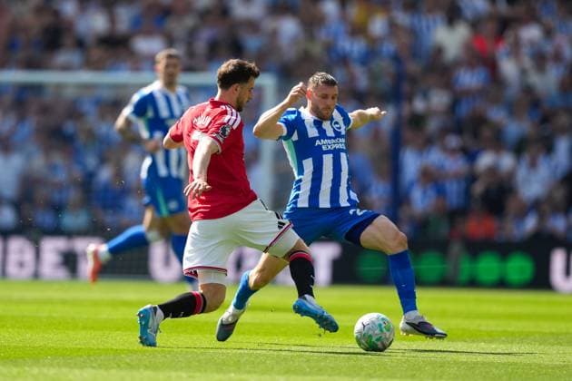 Mason Mount of Manchester United, ManU and James Milner of Brighton during the game. Brighton and Hove Albion v Manchester United, Premier League, Football, American Express Community Stadium, Brighton, UK - 24 May 2026Brighton American Express Community Stadi United Kingdom EDITORIAL USE ONLY No use with unauthorised audio, video, data, fixture lists, club league logos or live services. Online in-match use limited to 120 images, no video emulation. No use in betting, games or single club league player publications. Copyright: xSeanxRyan Shutterstockx 16889822ac