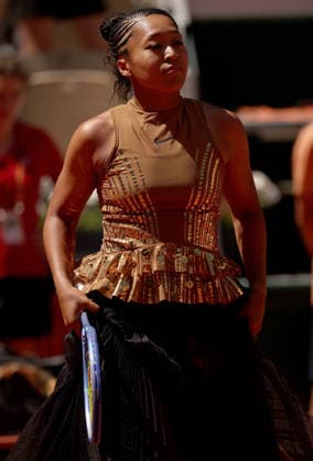Naomi Osaka of Japan wears a gold sequinned dress under a black sequinned long skirt and corset French Open Tennis, Day Three, Tennis, Roland Garros, Paris, France - 26 May 2026Paris Roland Garros France EDITORIAL USE ONLY No use with unauthorised audio, video, data, fixture lists, club league logos or live services. Online in-match use limited to 120 images, no video emulation. No use in betting, games or single club league player publications. Copyright: xEllaxLing Shutterstockx 16898259b