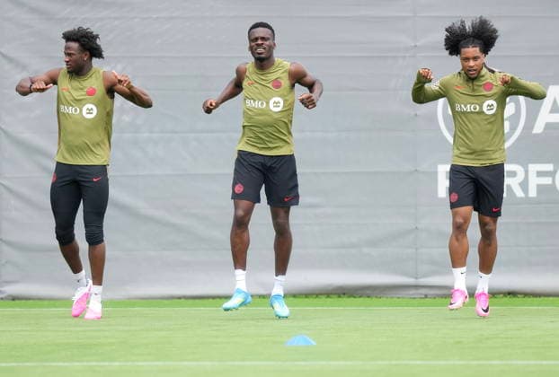 May 27, 2026, Charlotte, Nc, UNITED STATES: Canada teammates Ismao«l Kono , left, Tani Oluwaseyi, centre, and Jayden Nelson stretch during Team Canada World Cup roster selection camp in Charlotte, N.C., on Wednesday, May 27, 2026. Canada News - May 27, 2026 - ZUMAc35_ 20260527_zaf_c35_192 Copyright: xNathanxDenettex