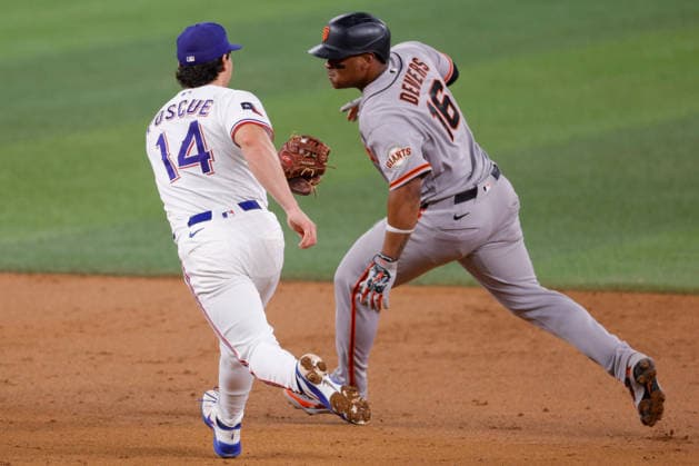 August 4, 2026, Arlington, Texas, USA: Texas Rangers second baseman JUSTIN FOSCUE (14) tags out San Francisco Giants first baseman RAFAEL DEVERS (16) in a baseball game, Tuesday, Aug. 4, 2026, in Arlington, Texas. MLB, Baseball Herren, USA 2026 - Giants4:5Rangers - ZUMAa325 20260804_zsa_a325_020 Copyright: xDavidxBalleringxIix
