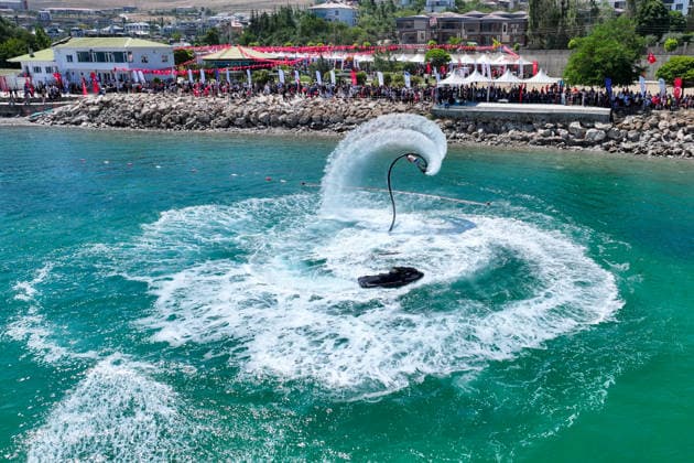 12th Van Sea Water Sports Festival kicks off on Lake Van VAN, TURKIYE - AUGUST 08: A view of participants and athletes taking part in the 12th Van Sea Water Sports Festival held at the Edremit-Gebze Water Sports Center on the shores of Lake Van in Van, Turkiye, on August 08, 2026. Organized to promote Lake Van and boost local tourism, the two-day event features Beach volleyball, Beachvolleyball and handball matches, flyboard demonstrations, canoeing, rowing, dragon boat races, and various recreational activities. Ozkan Bilgin Anadolu Van Turkey. Editorial use only. Please get in touch for any other usage. Copyright: x2026xAnadoluxOzkanxBilginx