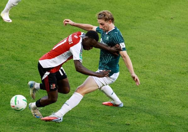 Andrew Oluwabori of Exeter City and Alex Hartridge of Plymouth Argyle. Plymouth Argyle v Exeter City, EFL Carabao Cup, First Round, Football, Home Park, Plymouth, UK - 10 Aug 2026Plymouth Home Park United Kingdom EDITORIAL USE ONLY No use with unauthorised audio, video, data, fixture lists, club league logos or live services. Online in-match use limited to 120 images, no video emulation. No use in betting, games or single club league player publications. Copyright: xJamesxMarsh Shutterstockx 17061088au
