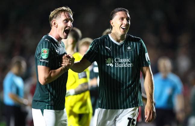 Ronan Curtis and Alex Mitchell of Plymouth Argyle celebrate at full time Plymouth Argyle v Exeter City, EFL Carabao Cup, First Round, Football, Home Park, Plymouth, UK - 10 Aug 2026Plymouth Home Park United Kingdom EDITORIAL USE ONLY No use with unauthorised audio, video, data, fixture lists, club league logos or live services. Online in-match use limited to 120 images, no video emulation. No use in betting, games or single club league player publications. Copyright: xKieranxMcManus Shutterstockx 17061087bw