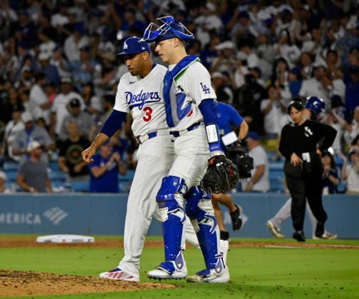 Los Angeles Dodgers closing pitcher Edwin Diaz celebrates with catcher Hunter Feduccia after securing his first save of August , closing out a 6-5 win over the Kansas City Royals after two blown saves in Arizona at Dodger Stadium in Los Angeles on Monday, August 10, 2026. LAP2026081003 JIMxRUYMEN