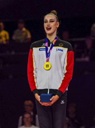 August 16, 2026, Frankfurt, Hesse, Germany: The gold medalist of Germany DARJA VARFOLOMEEV sings the German national anthem after winning the 42nd Rhythmic gymnastics, Rhythmische Sportgymnastik, RSG World Championships individual ball finals in the Festhalle in Frankfurt, Hesse, Germany on Sunday, August 16, 2026. 2026 Rhythmic Gymnastics World Championships Individual Finals - ZUMAd168 20260816_zsp_d168_033 Copyright: xKaixDambachx