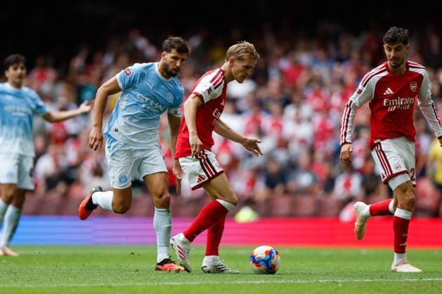 Martin Odegaard of Arsenal scores his teams third goal Arsenal v Manchester City, FA Community Shield, Principality Stadium, Cardiff, UK - 16 Aug 2026Cardiff Principality Stadium United Kingdom EDITORIAL USE ONLY No use with unauthorised audio, video, data, fixture lists, club league logos or live services. Online in-match use limited to 120 images, no video emulation. No use in betting, games or single club league player publications. Copyright: xMattxImpey Shutterstockx 17096419bd