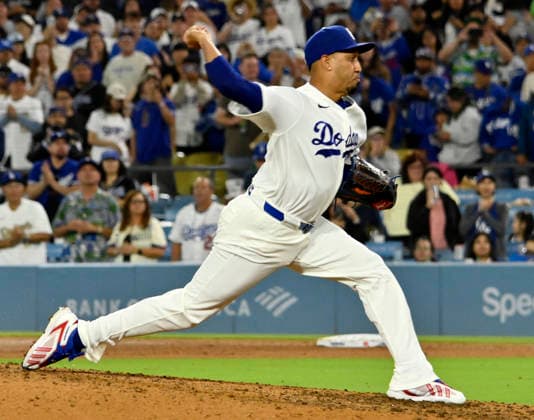 Los Angeles Dodgers closing pitcher Edwin Diaz winds up to deliver in the ninth inning agains the San Francisco Giants at Dodger Stadium in Los Angeles on Friday, September 18, 2026. The Dodgers defeated the Giants 8-2. LAP2026091820 JIMxRUYMEN
