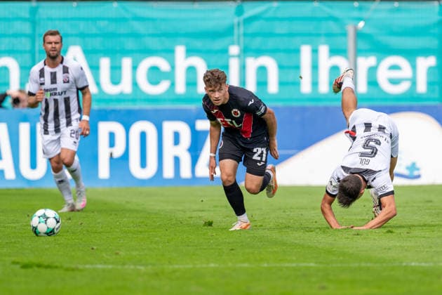 Yannick Deichmann (FC Ingolstadt 04, 20), Lucas Wolf (Viktoria Köln, 21) im Zweikampf mit Emre Guel (FC Ingolstadt 04, 05) der sich ueberschlaegt FC Viktoria Köln vs. FC Ingolstadt 04, Fussball, 3.Liga, 7.Spieltag, Saison 2026 27, 19.09.2026, DFL REGULATIONS PROHIBIT ANY USE OF PHOTOGRAPHS AS IMAGE SEQUENCES AND OR QUASI-VIDEO, FC Viktoria Köln vs. FC Ingolstadt 04, Fussball, 3.Liga, 7.Spieltag, Saison 2026 27, 19.09.2026 Köln Copyright: xEibner-Pressefoto LukasxBaldygax EP_LBA