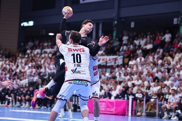 Torwurf von Domen Makuc (THW Kiel, 35) im Zweikampf mit Paul Ohl (TV Huettenberg, 10) GER, TV Huettenberg vs THW Kiel, Handball, DHB-Pokal, 2. Runde, Spielzeit 2026 2027, 23.09.2026 GER, TV Huettenberg vs THW Kiel, Handball, DHB-Pokal, 2. Runde, Spielzeit 2026 2027, 23.09.2026 Wetzlar Copyright: xEibner-Pressefoto RenexWeissx EP_RWS