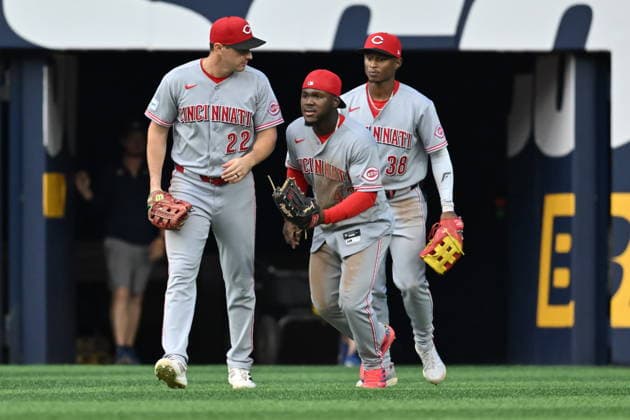September 26, 2026, Toronto, On, Canada: Cincinnati Reds J.J. Bleday (22), left to right, Hector Rodriguez (43) and Carlos Jorge (38) celebrate after their team defeated the Toronto Blue Jays in MLB, Baseball Herren, USA baseball action in Toronto on Saturday, Sept. 26, 2026. Canada News - September 26, 2026 - ZUMAc35_ 20260926_zaf_c35_094 Copyright: xJonxBlackerx