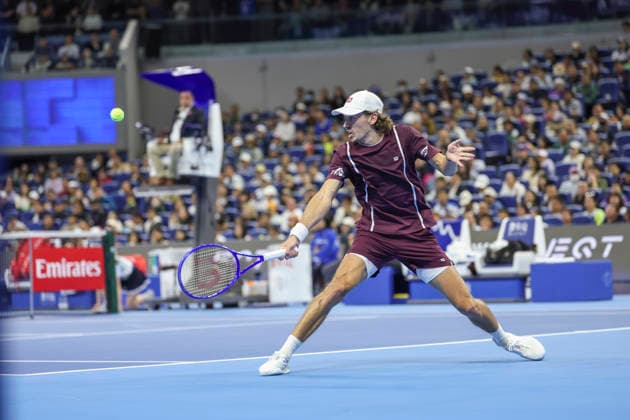 (261006) -- BEIJING, Oct. 6, 2026 -- Alex de Minaur of Australia hits a return during the men s singles final match against Novak Djokovic of Serbia at 2026 China Open tennis tournament in Beijing, China, Oct. 6, 2026. ) (SP)CHINA-BEIJING-TENNIS-CHINA OPEN-MEN S SINGLES-FINAL(CN) BaixXuefei