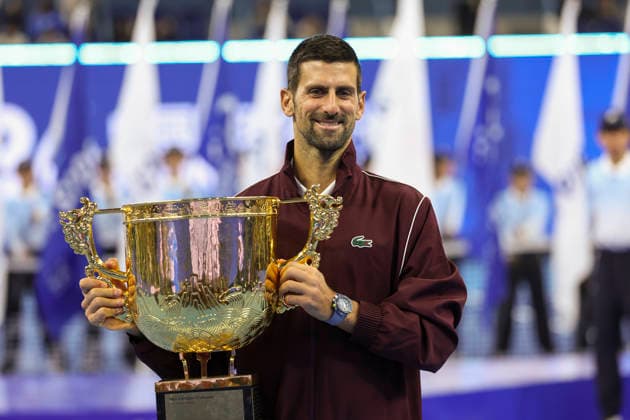 (261006) -- BEIJING, Oct. 6, 2026 -- Novak Djokovic of Serbia poses with his champion trophy during the awarding ceremony for the men s singles final at 2026 China Open tennis tournament in Beijing, China, Oct. 6, 2026. ) (SP)CHINA-BEIJING-TENNIS-CHINA OPEN-MEN S SINGLES-AWARDING CEREMONY(CN) BaixXuefei