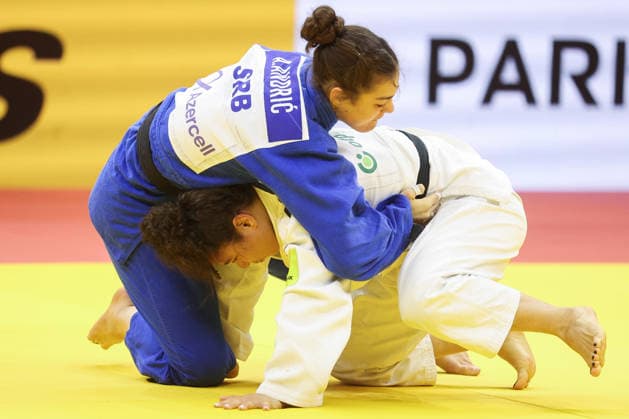 AZERBAIJAN, BAKU - OCTOBER 8, 2026: Madina Taimazova (bottom) of Russia and Aleksandra Andric of Serbia compete in their -70 kg bout as part of the 2026 World Judo Championships at the National Gymnastics Arena. Mikhail Sinitsyn TASS 98954767