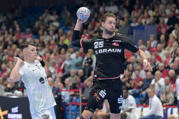Olle Forsell Schefvert (MT Melsungen 25) beim Wurf; Ihor Turchenko (HBC Nantes 7) (L) , GER, MT Melsungen - HBC Nantes (FRA), Handball, Champions League Maenner, Group Matches, Saison 2026 2027, 08.10.2026, GER, MT Melsungen - HBC Nantes Handball, CL Maenner, Group Match, Saison 2026 2027, 08.10.2026 Kassel Copyright: xEibner-Pressefotox xRolandxSippelx EP_RSL