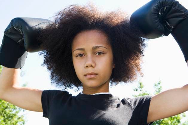 Serious teenage girl wearing boxing gloves Elk Grove, CA, USA, 21.12.2023, model released, TTBB_BLD099029.jpg, active, african-american ethnicity, aggression, arms raised, athletic, attitude, biceps, boxer, boxing gloves, brunette, childhood, close up, color image, competition, confidence, day, flexing, front view, head and shoulders, horizontal, looking at camera, low angle view, one person, outdoors, people, photography, portrait, posing, practicing, pride, rebellion, recreation, serious, sports, standing, strength, teenage girl, teenage girls, training, youth culture,, minority, minorities, gritaction, african, african american, african ethnicity, african-american, afro american, afro-american, aggressive, amusement, arm, bicep, black, Copyright: xDenisexCrewx