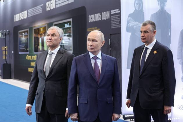 RUSSIA, MOSCOW - APRIL 24, 2026: Vyacheslav Volodin, Speaker of the Russian State Duma, President Vladimir Putin, and Leonid Slutsky (L-R), Chairman of the Russian Liberal Democratic Party (LDPR), view an exhibition titled Zhirinovsky, Continuation. LDPR , dedicated to the late leader of LDPR, Vladimir Zhirinovsky (1946-2022), and held at the Manege Central Exhibition Hall (Moscow Manege). Valery Sharifulin TASS 91644243