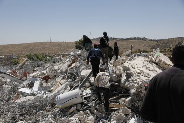 Israeli forces demolish Palestinian home in Hebron-area village Israeli army forces, accompanied by bulldozers, demolish a Palestinian home in the village of al-Deirat, east of Yatta, south of Hebron in the West Bank, on May 4, 2026. The demolition left a family, including children, displaced, as the operation was carried out under military presence that prevented residents from approaching, amid ongoing demolitions in various areas across the West Bank. Photo by Mamoun Wazwaz apaimages Hebron West Bank Palestinian Territory 040526_Hebron_MW_00(44) Copyright: xapaimagesxMamounxWazwazx xapaimagesx