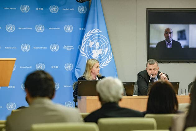 May 5, 2026, New York, New York, USA: JONATHAN PRENTICE, Head of the UN Network on Migration, speaks as ZOE BRENNAN, IOM Spokesperson sits next to him and PABLO ROJAS COPPARI, STUART RUSSELL CAMPO, IOM researchers are on screens behind him during a press briefing at UNHQ on the launch of the World Migration Report during the Second International Migration Review Forum (IMRF). The briefing focused on migration trends, data and international cooperation. New York USA - ZUMAo116 20260505_znp_o116_024 Copyright: xBiancaxOterox
