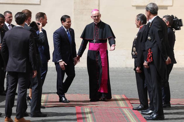 Vatican City, May 7, 2026: U.S. Secretary of State Marco Rubio and his wife, Jeanette Dousdebes Rubio, arrive in the San Damaso Courtyard, where they were received by Apostolic Nuncio Petar Rajic for an official meeting with Pope Leo XIV and Cardinal Pietro Parolin. The visit takes place in a particularly delicate diplomatic climate, following Donald Trump s recent statements against the Pontiff, which have attracted the attention of the international community and global media. The meeting thus takes on strong symbolic and institutional significance, focusing on the dialogue between the Holy See and the United States, geopolitical tensions, and the role of Vatican diplomacy in the contemporary landscape. Copyright: xmarcoxiacobuccix xipa-agency.netx xmarcoxiacobuccix IPA_Agency_IPA74485802