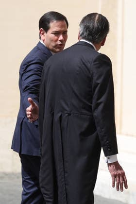 Vatican City, May 7, 2026: U.S. Secretary of State Marco Rubio and his wife, Jeanette Dousdebes Rubio, arrive in the San Damaso Courtyard, where they were received by Apostolic Nuncio Petar Rajic for an official meeting with Pope Leo XIV and Cardinal Pietro Parolin. The visit takes place in a particularly delicate diplomatic climate, following Donald Trump s recent statements against the Pontiff, which have attracted the attention of the international community and global media. The meeting thus takes on strong symbolic and institutional significance, focusing on the dialogue between the Holy See and the United States, geopolitical tensions, and the role of Vatican diplomacy in the contemporary landscape. Copyright: xmarcoxiacobuccix xipa-agency.netx xmarcoxiacobuccix IPA_Agency_IPA74485827